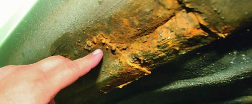 Порог, отремонтированный приваркой латки.